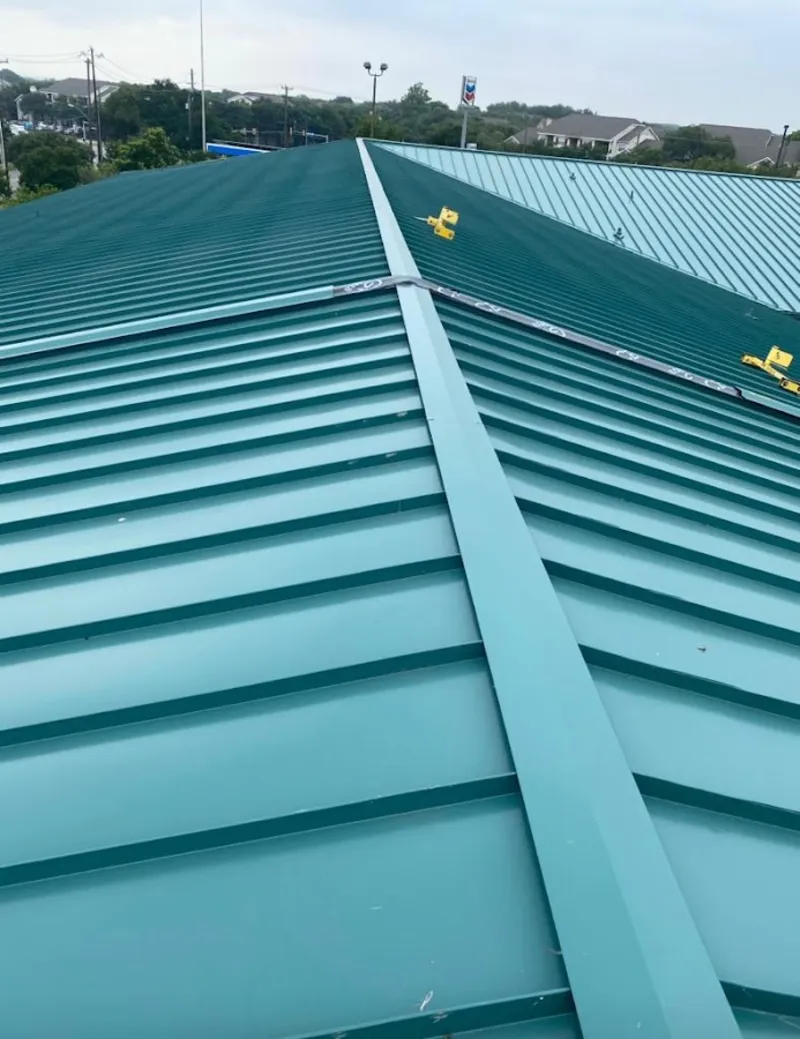 Green commercial metal roof ridge and valley for Metal Roof Repair in Connellsville